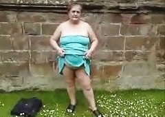 Large granny demonstrating her nude body