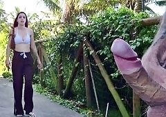 Risky handjob for hot redhead on the walk in the park in public!